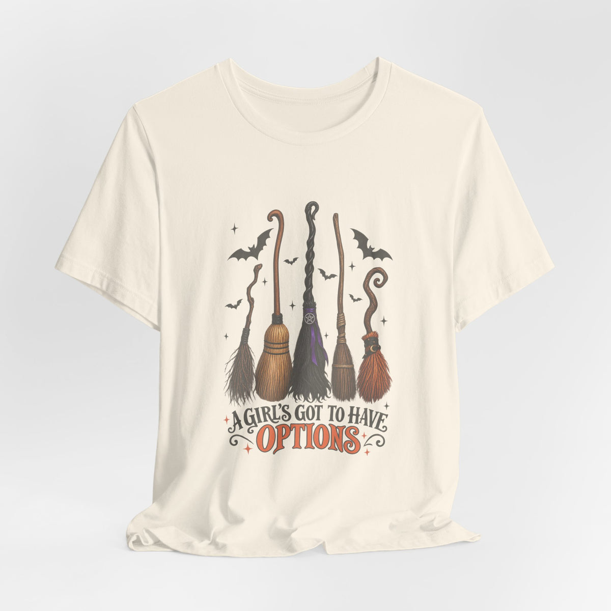 Witch Brooms Tee — "A Girl's Got to Have Options" Halloween T‑Shirt